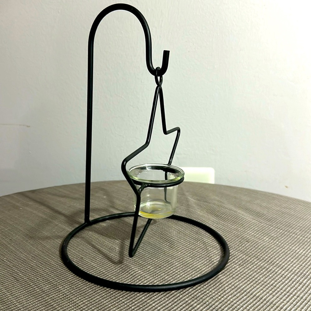 Metal star candleholder with metal hanger 10 inches tall